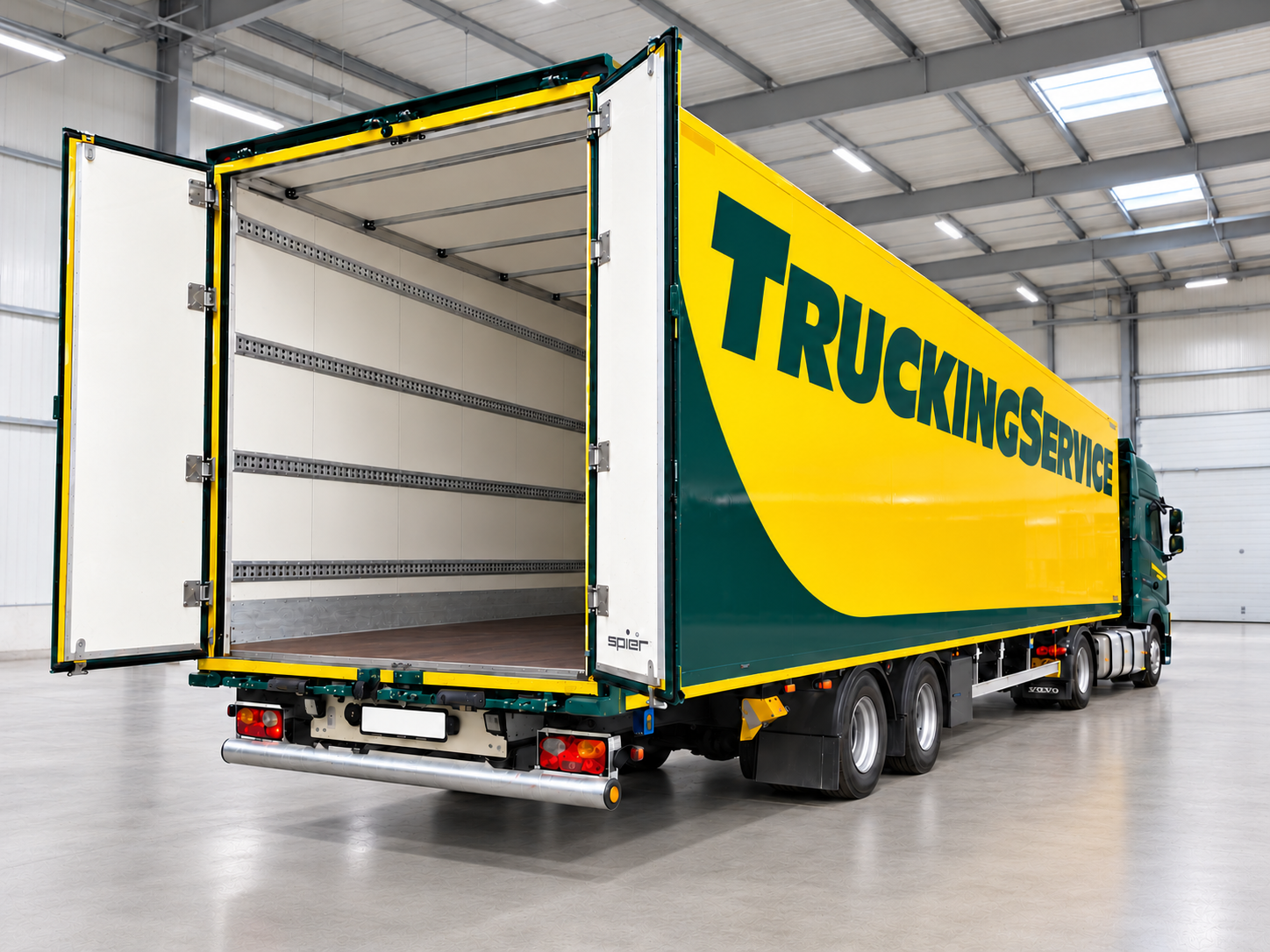 Megacube Flatfloor with open rear doors and four lashing rails inside the trailer